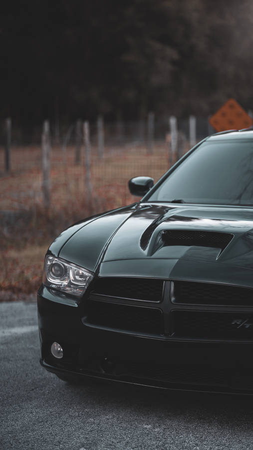 Dodge Challenger With Black Cross Emblem Wallpaper