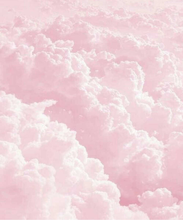 Dreamy Pastel Ipad Wallpaper With Thick Pink Clouds Wallpaper