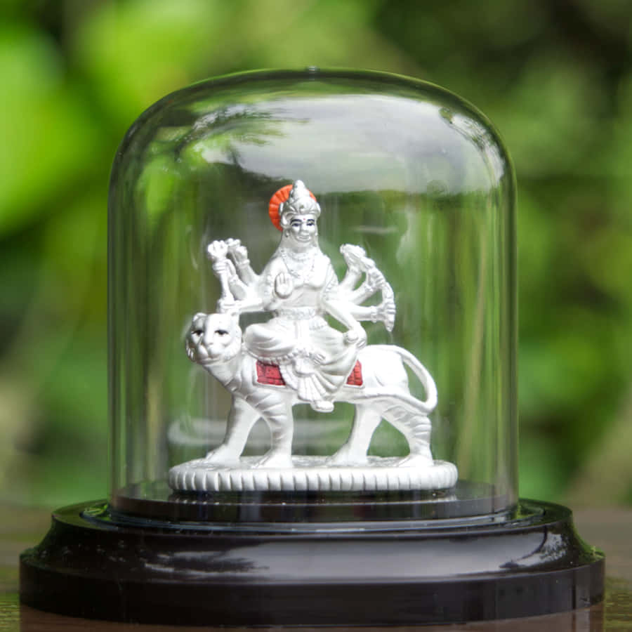 Durga Statue Under Glass Dome Wallpaper