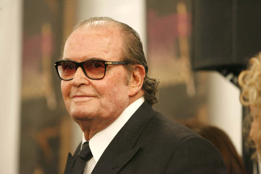 Elderly Manin Black Suitand Sunglasses Wallpaper