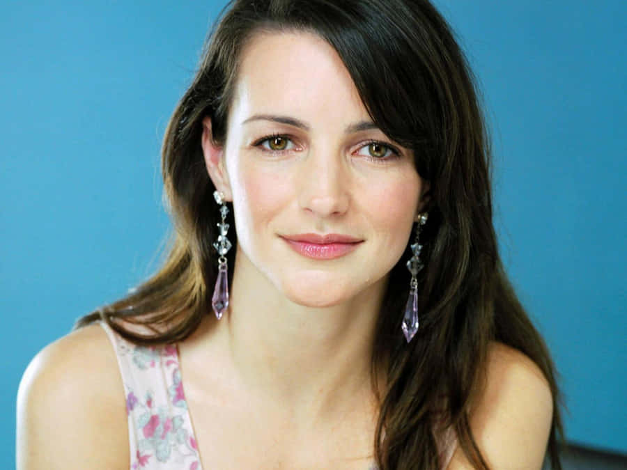 Elegant Kristin Davis Posing In Stylish Red Dress Wallpaper