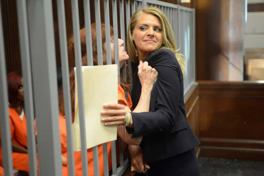 Eliza Coupe Striking A Pose In A Photoshoot Wallpaper