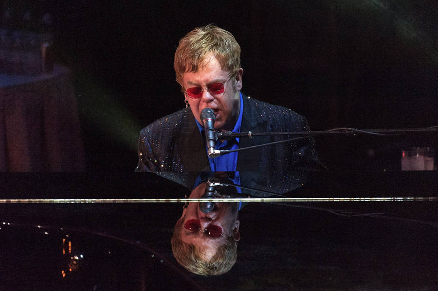 Elton John Concert Piano Reflection Wallpaper