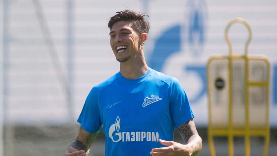 Emiliano Rigoni Smiling During Training Wallpaper