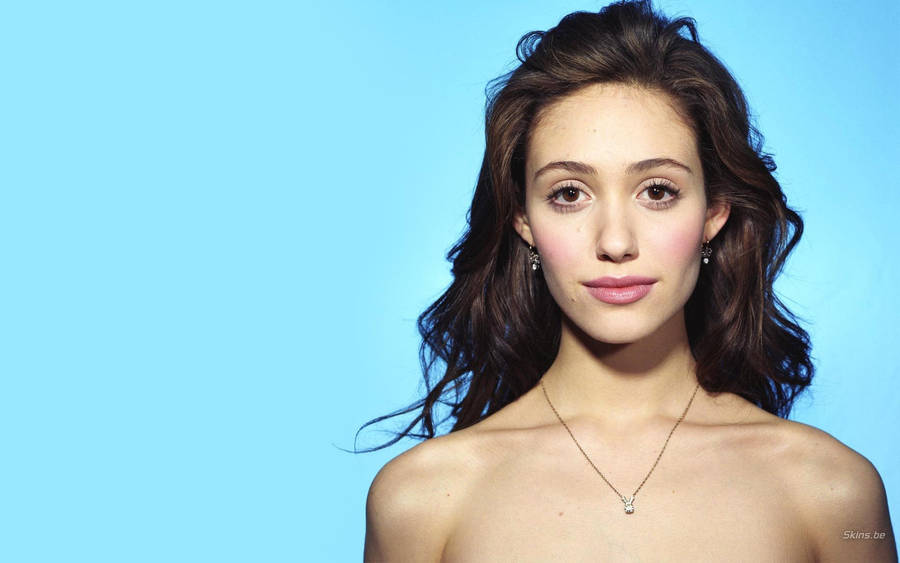 Emmy Rossum On Blue Wallpaper