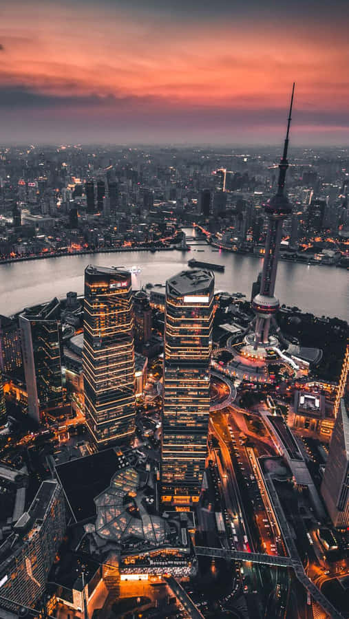 Enjoy A City Skyline Sunset From The Comfort Of Your Iphone Wallpaper