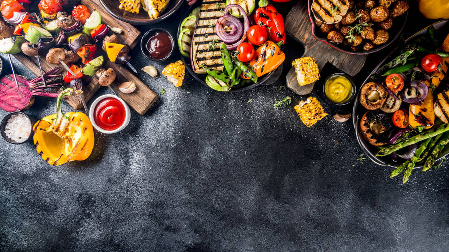 Enjoy An Explosion Of Flavor With This Delicious Plate Of Food Wallpaper