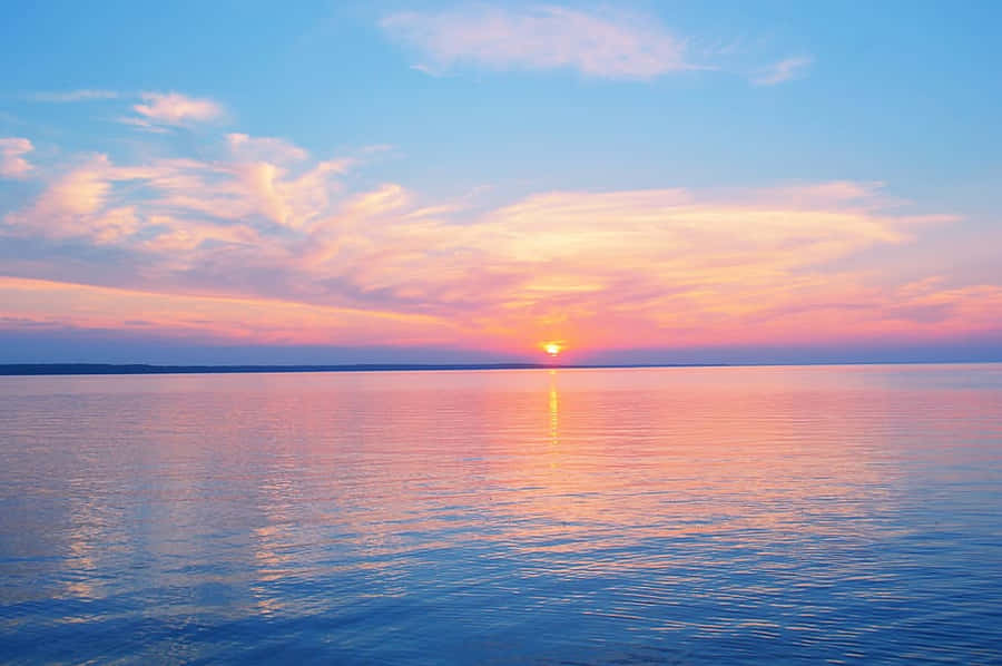 Enjoy Peace And Relaxation On A Beautiful Pastel Beach Wallpaper