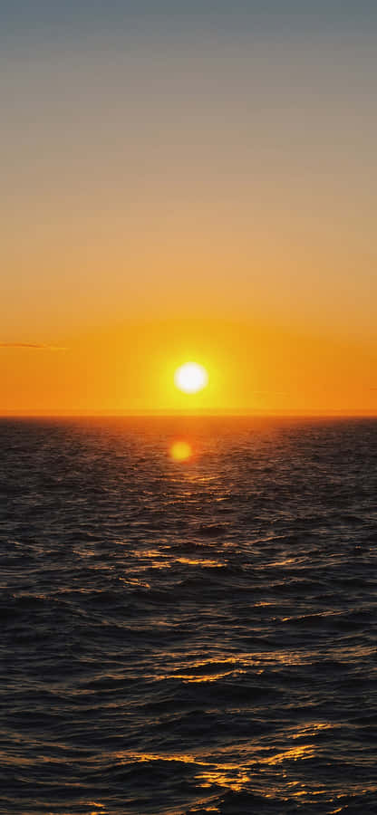 Enjoy The Calming Sunrise With Your Iphone Wallpaper