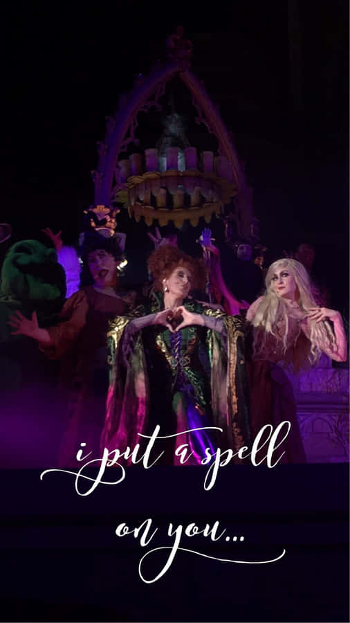 Enjoy The Magical Delights Of Hocus Pocus On Your Iphone Wallpaper