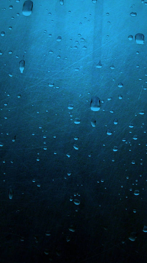 Enjoy The Peace And Serenity Of The Rain With Your Iphone Wallpaper