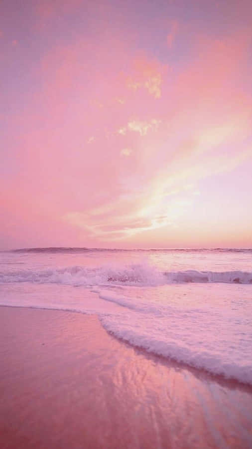 Enjoy The Serene Beauty Of Pink Beach Aesthetic Wallpaper
