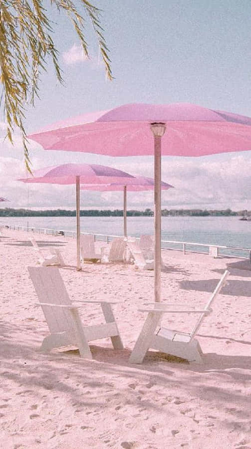 Enjoy The Sweetness Of Summer With A Pink Sunset Wallpaper