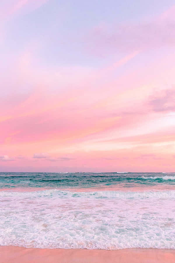 Enjoying A Calm And Pastel-hued Beach Wallpaper
