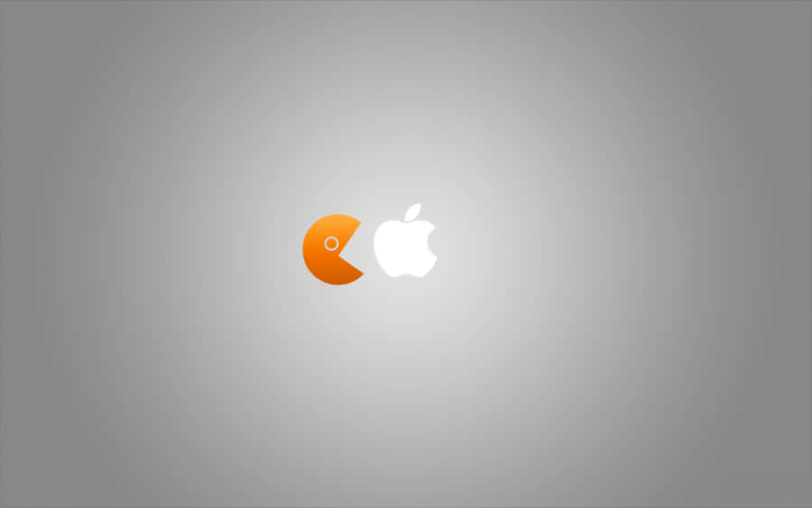 Enjoying A Classic Arcade Game Wallpaper