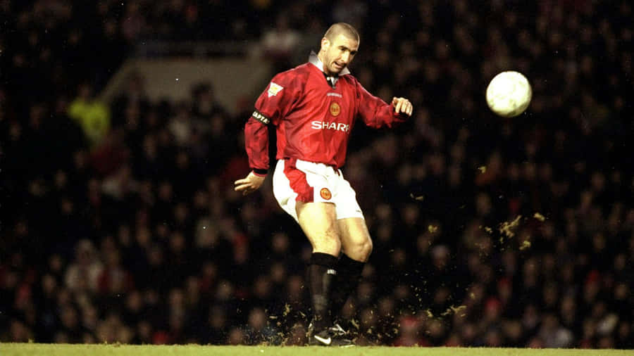 Eric Cantona With Flying Ball Wallpaper