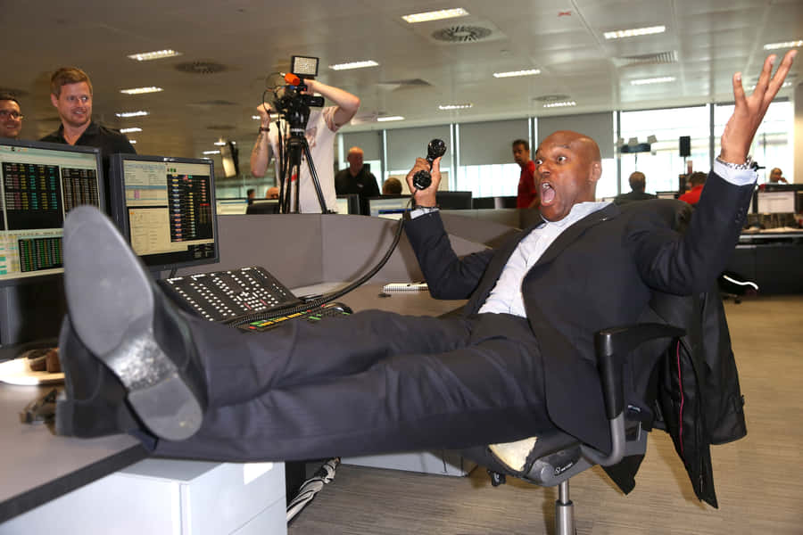 Excited Businessman Trading Floor Wallpaper
