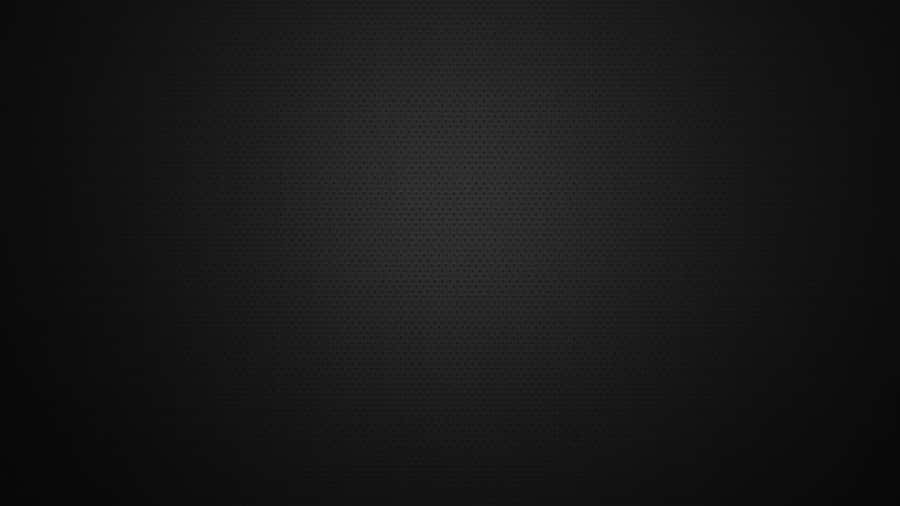 Experience A Modernized Yet Simplistic Look With This Sleek Plain Black Desktop Wallpaper Wallpaper