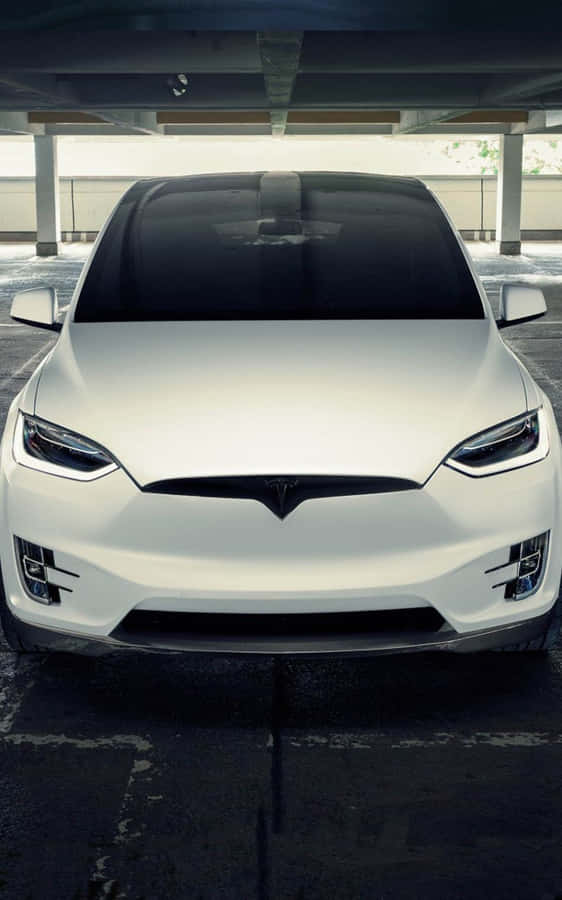 Experience The Future Of Smartphones With Tesla Iphone Wallpaper