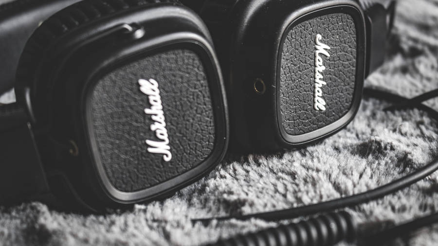 Experience The Power Of Music With Marshall Headphones Wallpaper