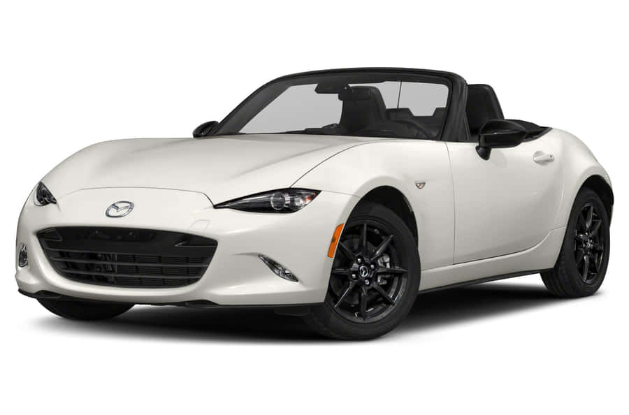 Experience The Thrill And Precision Of Driving A Mazda Mx 5 Miata Wallpaper