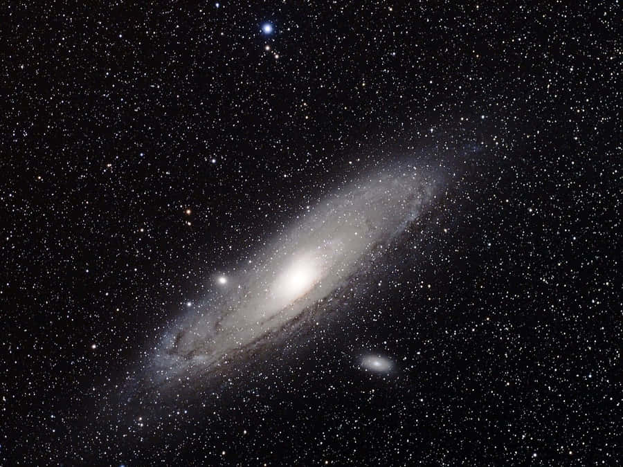 Explore The Unknown Depths Of Black Space Wallpaper