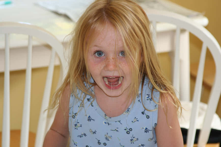 Expressing Frustration: Man With Head In Hands Wallpaper