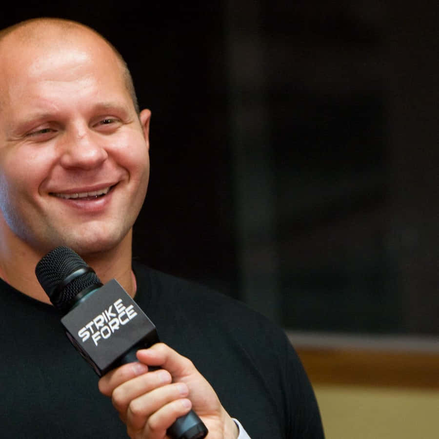 Fedor Emelianenko, Pride Of Russian Mma, Showcases Triumph Smile Wallpaper