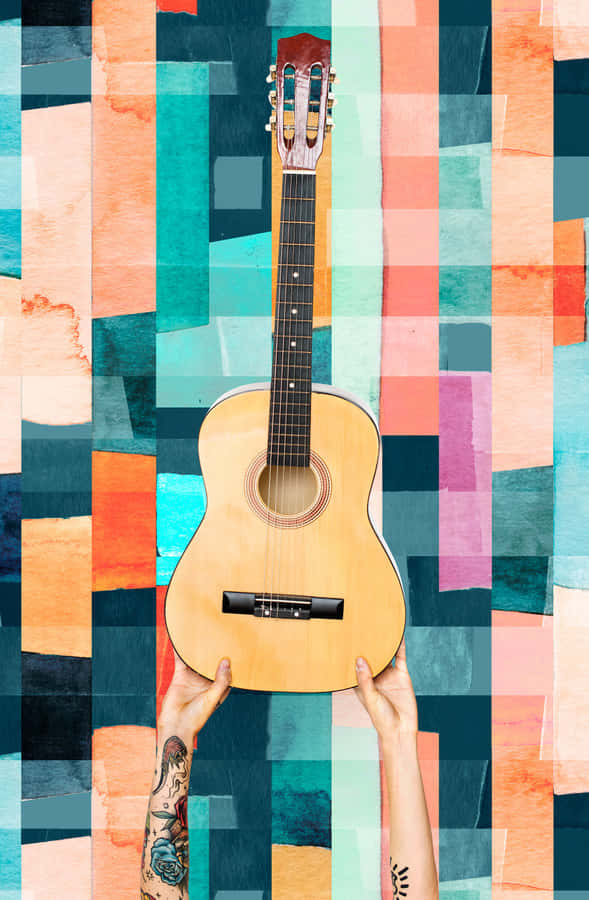 Feel The Music With This Vibrant Electric Guitar Wallpaper