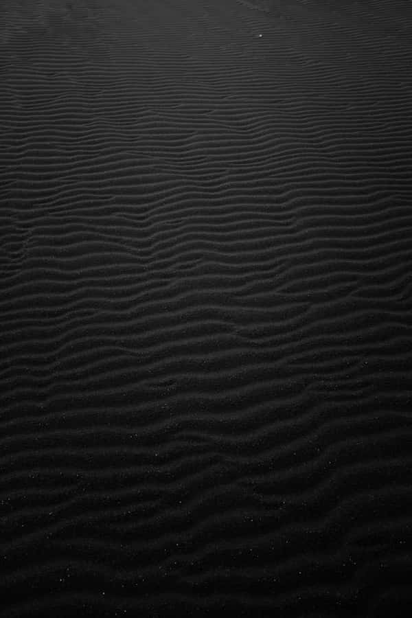 Feel The Soft Yet Luxurious Touch Of Black Leather Wallpaper