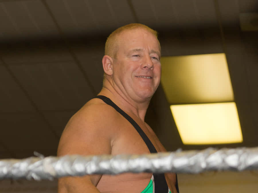 Fit Finlay Smiling Stampede Wrestling Show Wallpaper