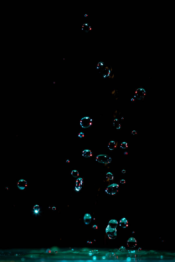 Floating Bubbles Black Phone Wallpaper