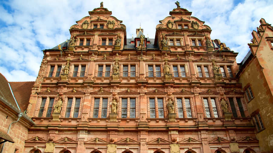 Fluffy Clouds Above Heidelberg Castle Wallpaper