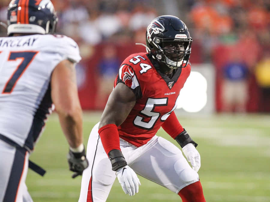 Focused Linebacker Readyfor Action Wallpaper