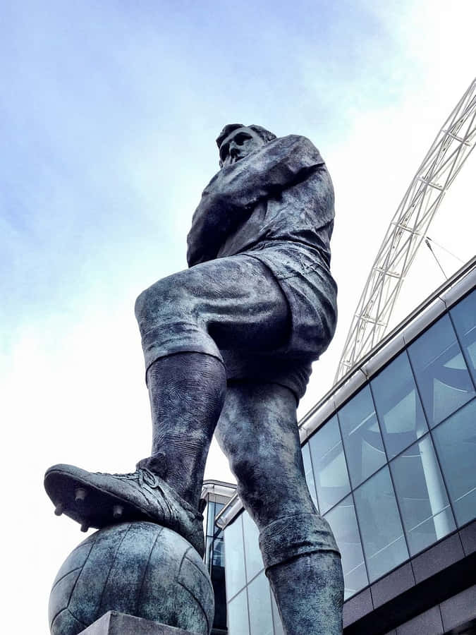 Football Athlete Bobby Moore Statue Wallpaper