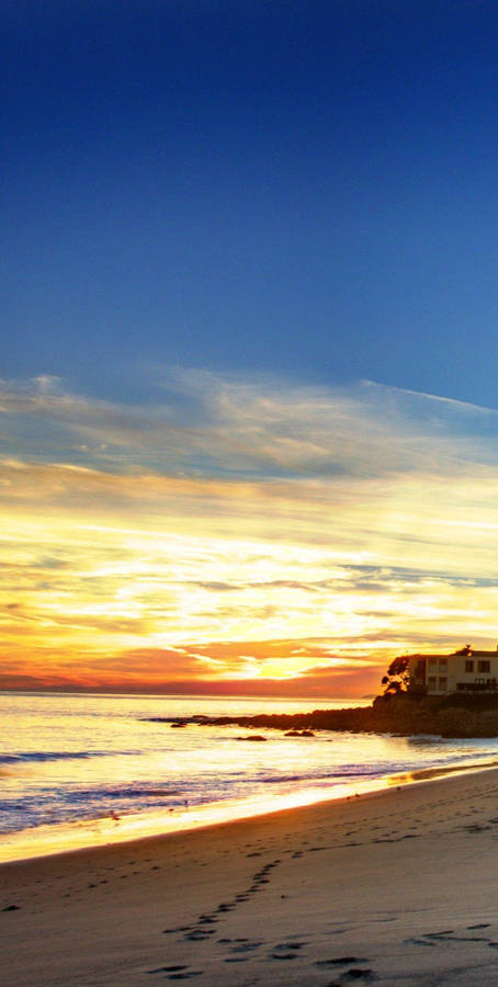 Footprints On Shores Of Malibu Beach Wallpaper