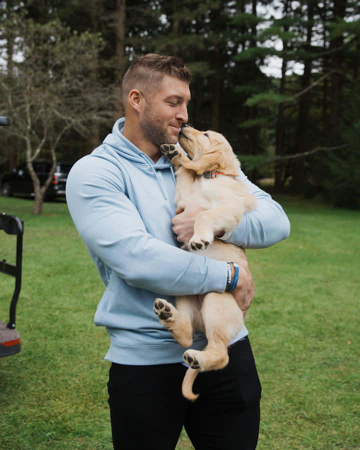 Former Nfl Quarterback, And Philanthropist Tim Tebow Wallpaper