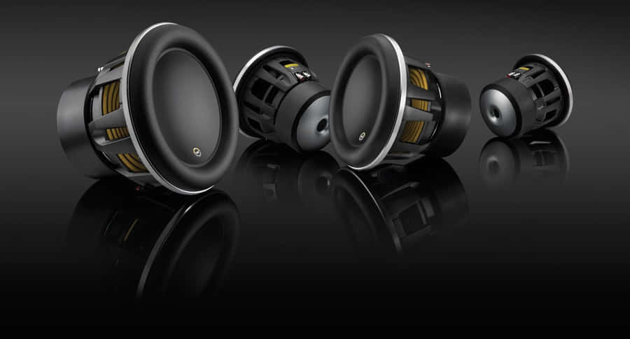 Four Black Jl Audio Speaker Parts Wallpaper