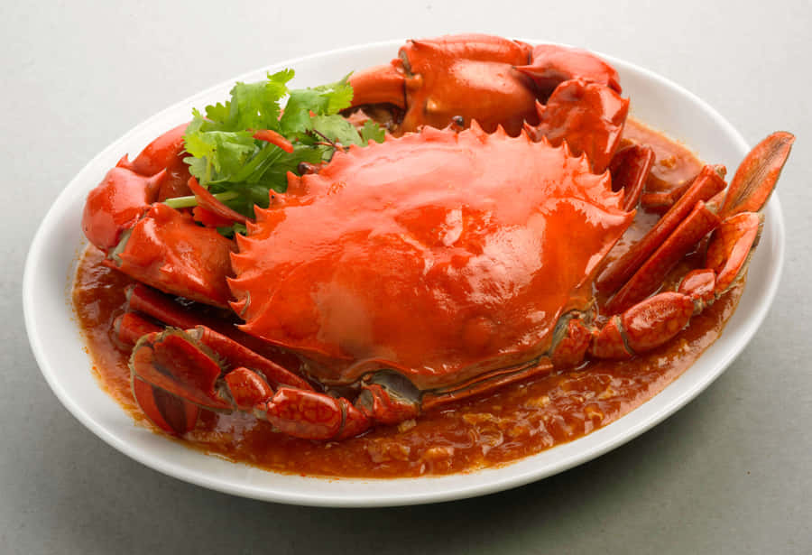 Fresh Chilli Crab On White Platter Wallpaper