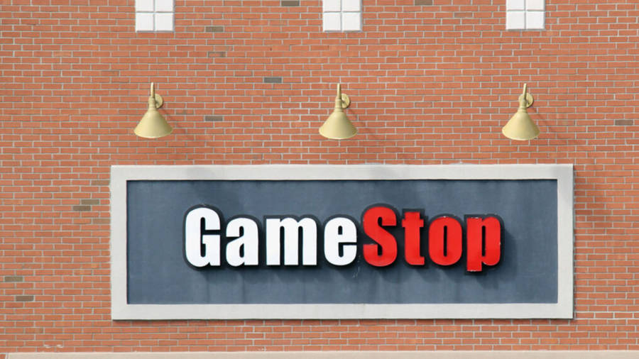 Gamestop Orange Brick Wall Sign Wallpaper