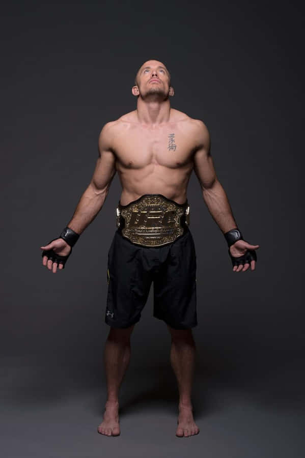 Georges St-pierre Looking Up Photoshoot Wallpaper