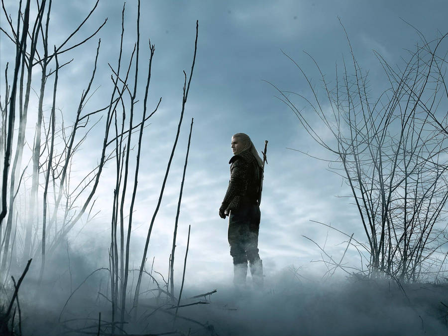 Geralt Gallivanting Through The Misty Mountains Wallpaper