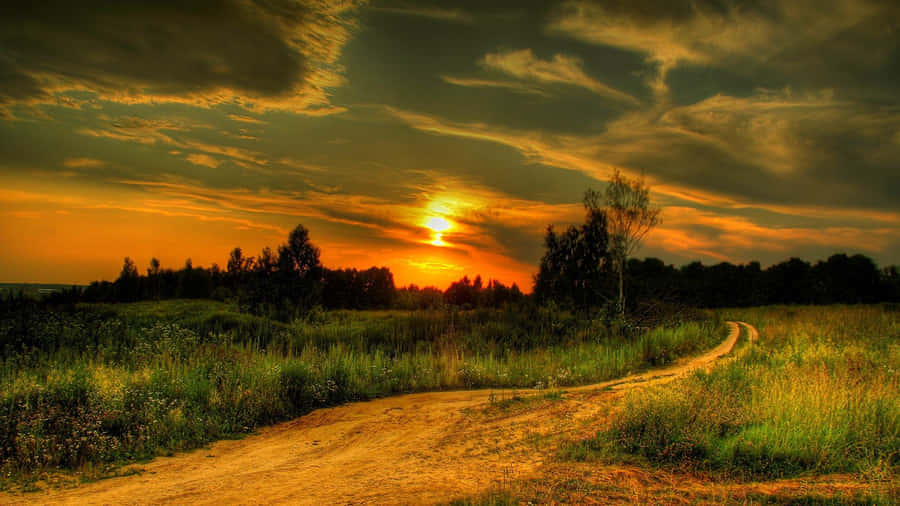 German Countryside Road At Sunset Wallpaper