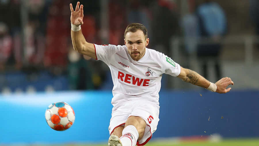 German Footballer Rafael Czichos Dribbling Wallpaper