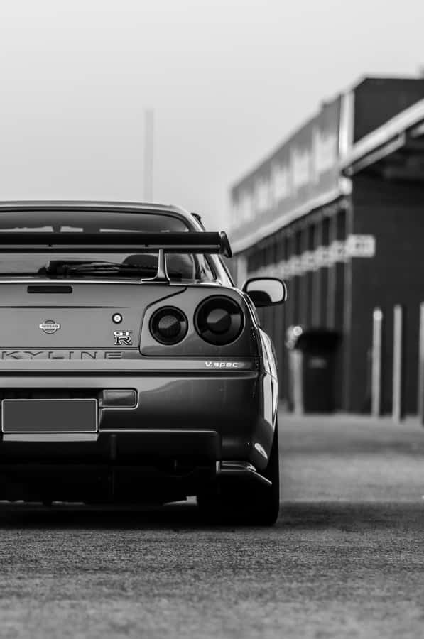 Get Ready For A Thrill Ride With The Gtr Iphone Wallpaper