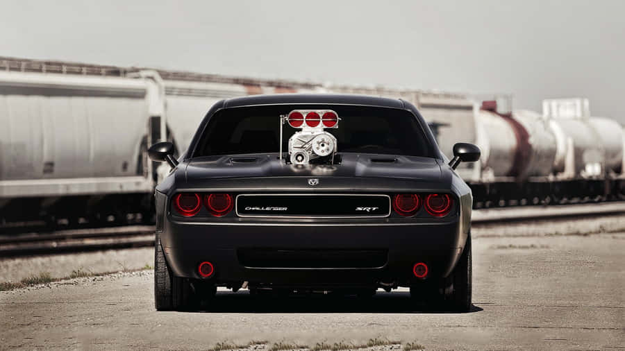 Get Ready To Rev Your Engines With The Dodge Challenger Wallpaper