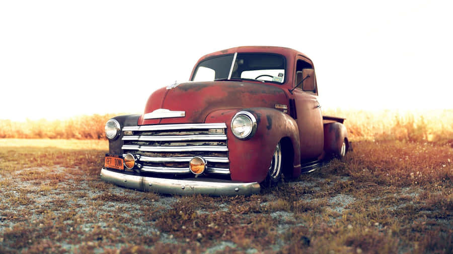 Get Ready To Ride In Style With The Low Truck Wallpaper