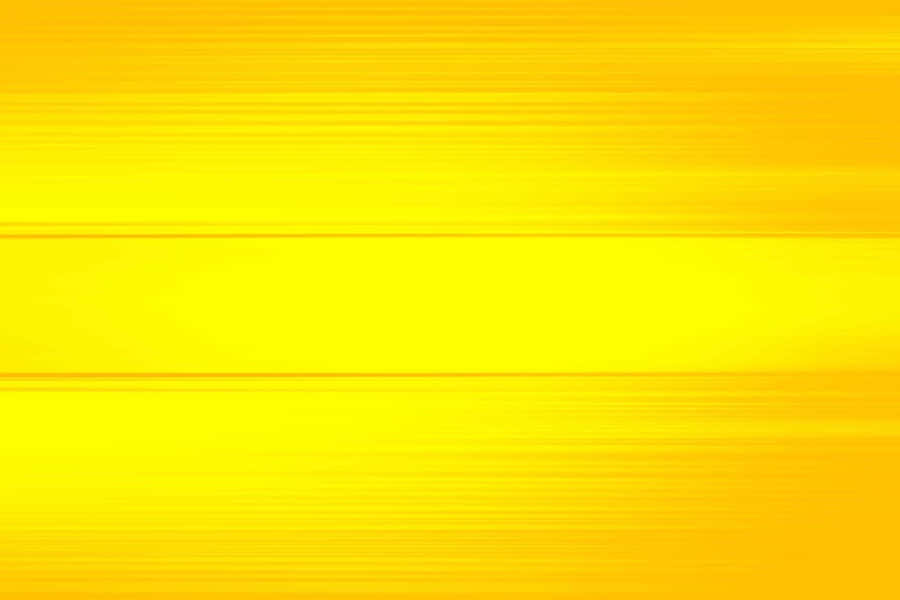 Get Work Done On The Go With The Stylish Pastel Yellow Laptop. Wallpaper