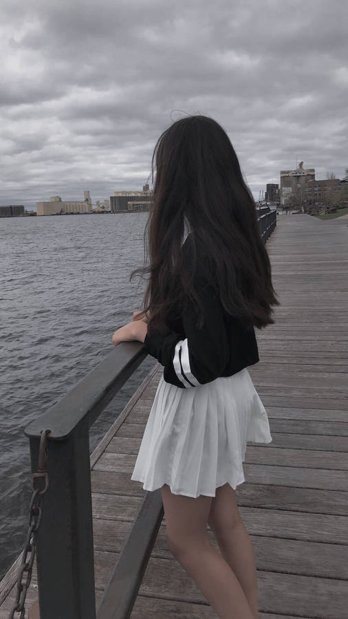 Girl Aesthetic At Boat Dock Wallpaper