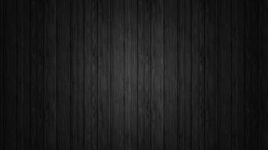 Glossy Black Background With A Sleek Texture. Wallpaper